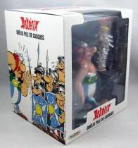 Asterix - Plastoy 8inch Plastic Figure  - Obelix with a stack of helmets