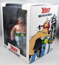 Asterix - Plastoy 8inch Plastic Figure  - Obelix with a stack of helmets