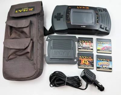 Atari - Console LCD Handheld Game - Lynx (ref. PAG-0200) + 3 Games + Transport Pack + Car Charger & Sun Visor