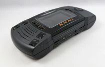 Atari - Console LCD Handheld Game - Lynx (ref. PAG-0400) + 4 Jeux + Sacoche Transport + Chargeur Voiture & Pare-Soleil