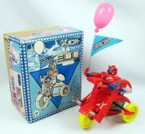Bomber X - Big Dai X on a tricyle car wind-up toy