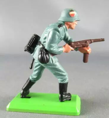 Britains Deetail - WW2 - Allemand - 1�re s�rie avan�ant 2 mains sur mitraillette Etat Neuf