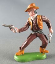 Britains Herald - Cowboy - Piéton 2 revolvers jambes droite avançée (réf 60?)
