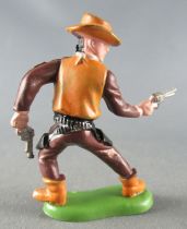 Britains Herald - Cowboy - Piéton 2 revolvers jambes droite avançée (réf 60?)