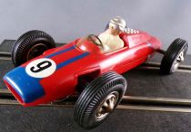 Carrera Universal 40402 - Lotus 25 Climax F1 Rouge Bandes Bleues N°9 1962 sans Boite 1/32