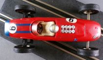 Carrera Universal 40402 - Lotus 25 Climax F1 Rouge Bandes Bleues N°9 1962 sans Boite 1/32