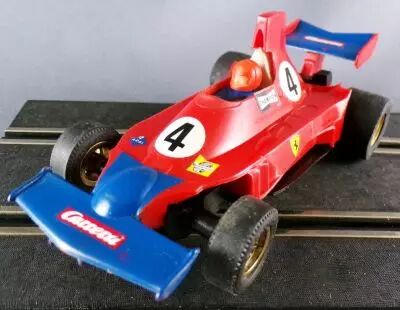 Carrera Universal 40408 - Ferrari 312 T F1 Rouge N�4 sans Boite 1/32