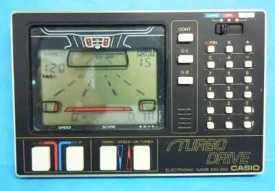 Calculatrice Jeu Casio MG-200 Turbo Drive – Vintage 1983, état Fonctionnel