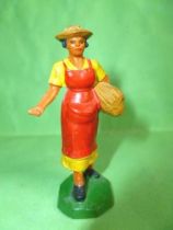 Clairet - farm - Farm woman giving seeds (yellow & red)