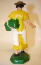 Clairet - farm - Farm woman giving seeds (yellow & white)