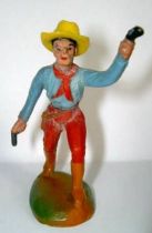 Clairet - wild west - cow boy 1st series - footed advancing two guns left arm up (blue & red)
