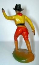 Clairet - wild west - cow boy 1st series - footed advancing two guns left arm up (red & yellow)