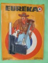 Eureka - Pistolet tir aux pigeons avec flechette neuve sur carte Cowboy