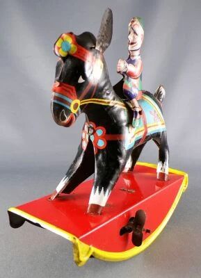 Gama Joustra - Clown Arlequin sur AZ - Jouet M�canique en T�le 1962