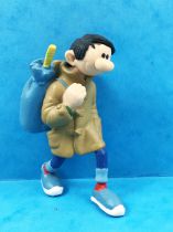 Gaston - Plastoy PVC Figure - Gaston with maroon Overcoat and Bundle