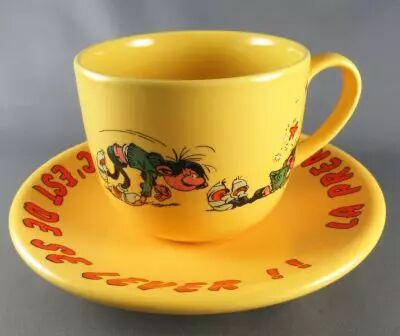 Gaston Lagaffe - Tropico Diffusion - Grande Tasse et Soucoupe C�ramique La 1�re gaffe c\'est de se lever