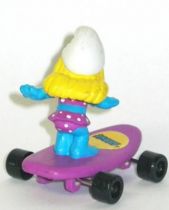 Hardee\'s Smurfette bathing dress on purple skateboard