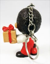 Kiki - Figurine pvc Bully - Garçon avec paquet cadeau