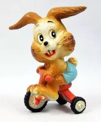 Lapin & Caneton - Figurine PVC Maia Borges - Lapin brun sur tricyle