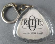Le Manège enchanté - Porte Clés Triangle - Père Pivoine Fond Bleu