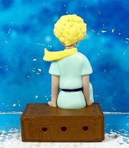 Le Petit Prince assis sur la caisse (A. de St. Exupery) - figurine PVC - Plastoy 2007