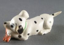 Les 101 dalmatiens - Figurine Jim - Chiot allongé croquant (collier vert)