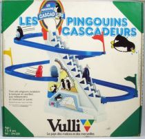 les_pingouins_cascadeurs___jouet_mecanique___vulli