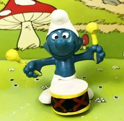 Les Schtroumpfs - Schleich - 20009 Schtroumpf avec tambour (noir & rouge)