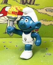 Les Schtroumpfs - Schleich - 20030 Schtroumpf porteur de la flamme (Téléthon)