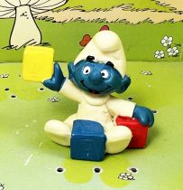Les Schtroumpfs - Schleich - 20214 Bébé Schtroumpf assis avec cubes (jaune)