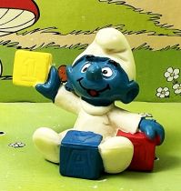 Les Schtroumpfs - Schleich - 20214 Bébé Schtroumpf assis avec cubes (jaune)