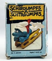 Les Schtroumpfs - Schleich - 40201 Schtroumpf avec luge (neuf en boite)