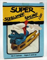 Les Schtroumpfs - Schleich - 40201 Schtroumpf avec luge (neuf en boite)
