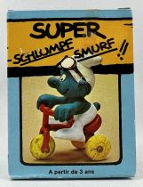 Les Schtroumpfs - Schleich - 40203 Schtroumpf sur Tricycle (neuf en boite) 