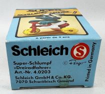 Les Schtroumpfs - Schleich - 40203 Schtroumpf sur Tricycle (neuf en boite) 