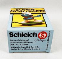 Les Schtroumpfs - Schleich - 40204 Schtroumpf sur skateboard végétal (neuf en boite)