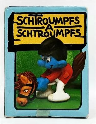 Les Schtroumpfs - Schleich - 40214 Schtroumpf sur Cheval de Bois (neuf en boite)