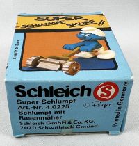 Les Schtroumpfs - Schleich - 40225 Schtroumpf avec tondeuse à gazon (neuf en boite)