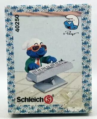 Les Schtroumpfs - Schleich - 40250 Schtroumpf avec Synth�tiseur (Boite New Look)