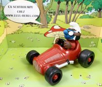 Les Schtroumpfs - Schleich - 40255 Schtroumpf avec voiture de course (rouge foncé)