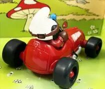 Les Schtroumpfs - Schleich - 40255 Schtroumpf avec voiture de course (rouge foncé)
