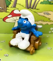 Les Schtroumpfs - Schleich - Schtroumpf en fauteuil roulant (figurine promotionnelle des Paralysés de France)