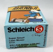 Les Schtroumpfs - Schleich / Wallace Berrie - 40225 Schtroumpf avec tondeuse à gazon (neuf en boite)