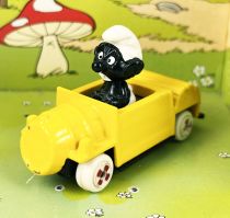 Les Schtroumpfs - Voiture métal Esci - Schtroumpf noir en voiture jaune (occasion)