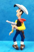 Lucky Luke - Plastoy PVC figure - Lucky Luke shooting in his back