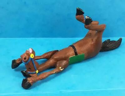 Lucky Luke - Prototype en R�sine - Cheval marron couch� sur le dos (articul�)