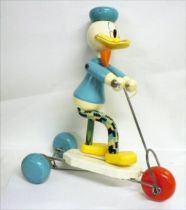 Mickey and friends - Pull-up Toy - Donald Duck on his Kick Scooter (Vilac)