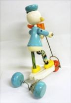Mickey and friends - Pull-up Toy - Donald Duck on his Kick Scooter (Vilac)