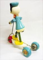 Mickey and friends - Pull-up Toy - Donald Duck on his Kick Scooter (Vilac)