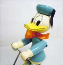 Mickey and friends - Pull-up Toy - Donald Duck on his Kick Scooter (Vilac)